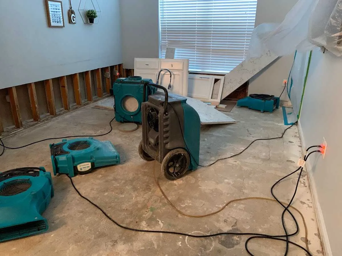 Dehumidifier in flood-cut room for Water Damage Restoration in Dumont